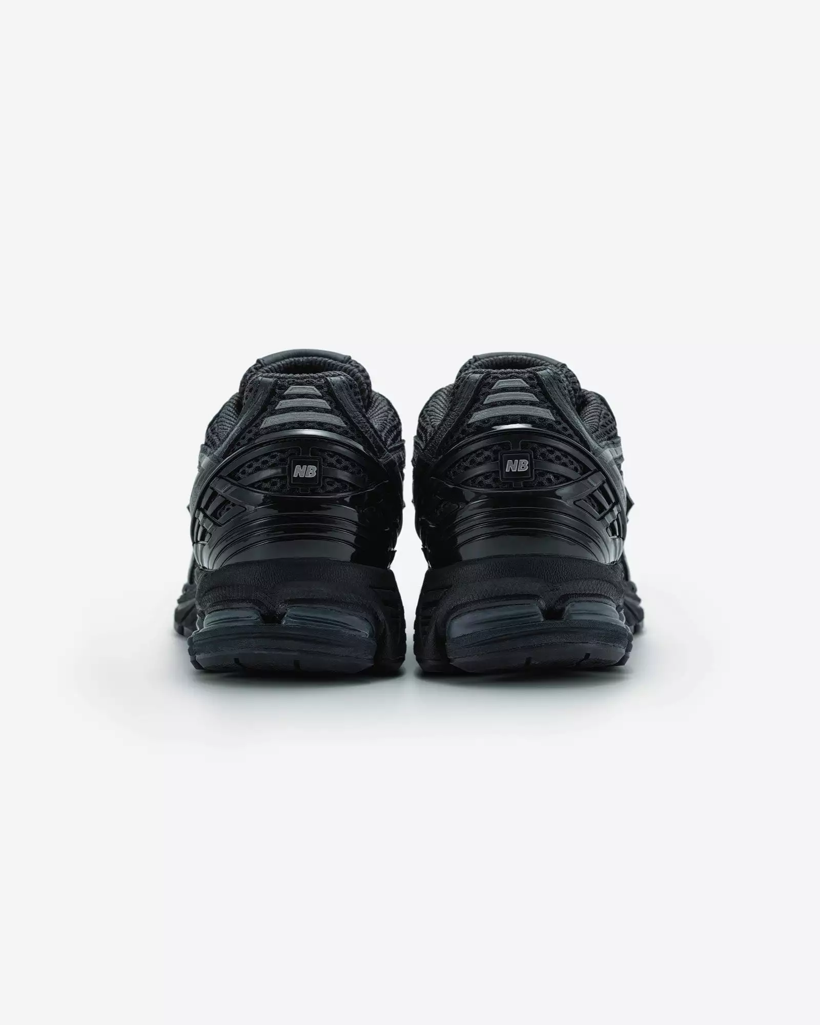 CDG x New Balance in Black/Black