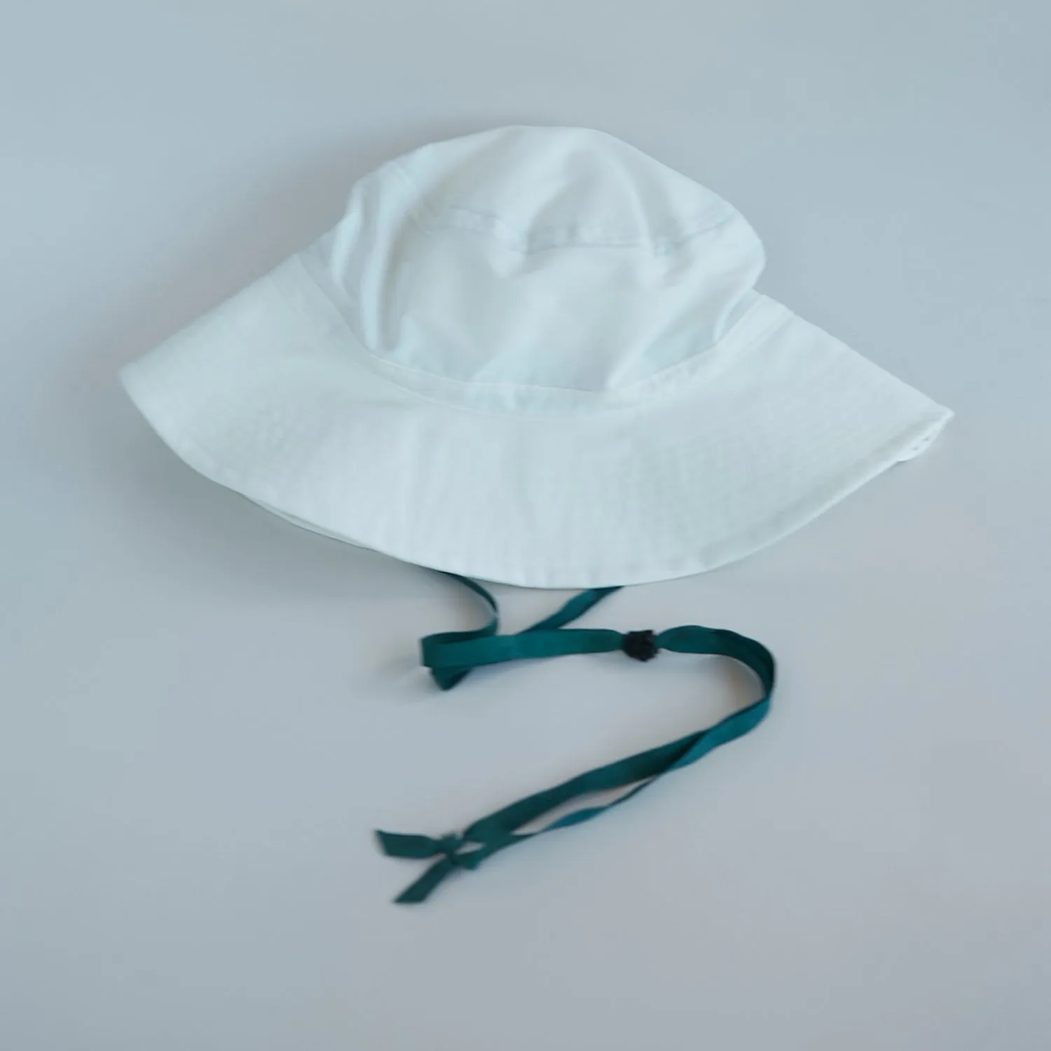 Milai Cotton Bucket Hat by Maison Enku